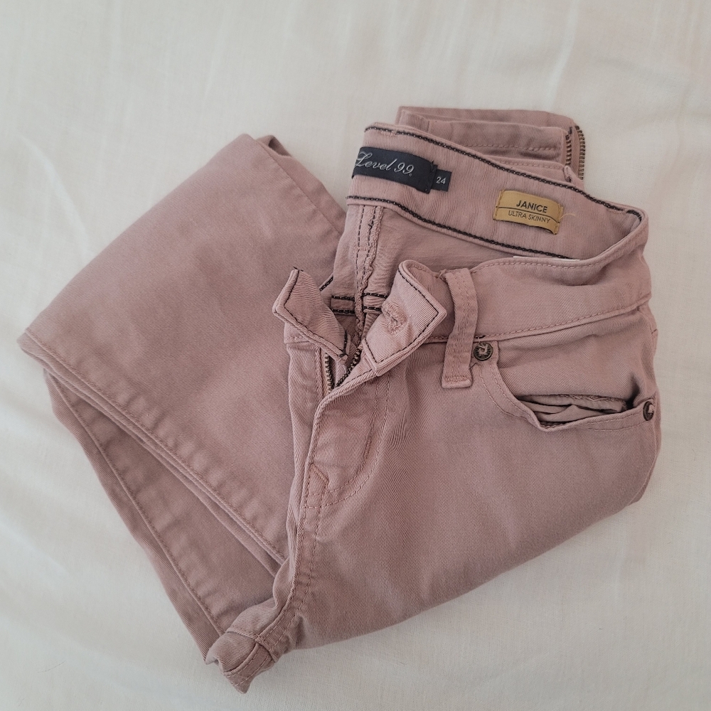Level 99- pink mid rise skinny jeans